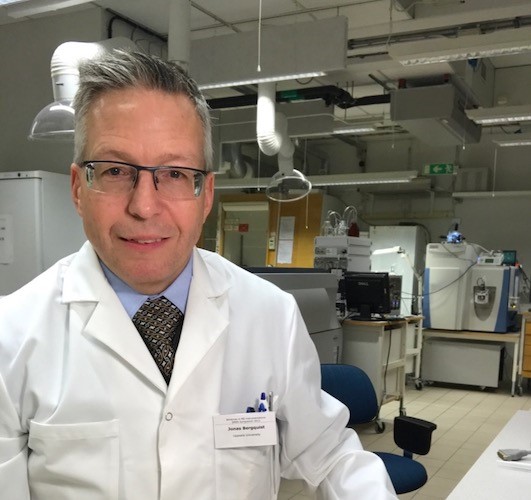 Jonas Bergquist seated in a lab