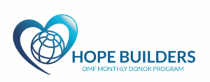 The image features the logo for the "Hope Builders" (OMF Monthly Donor Program). The logo includes a stylized heart intertwined with a globe.